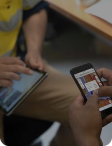 Site workers using Propeller mobile on tablet and smartphone