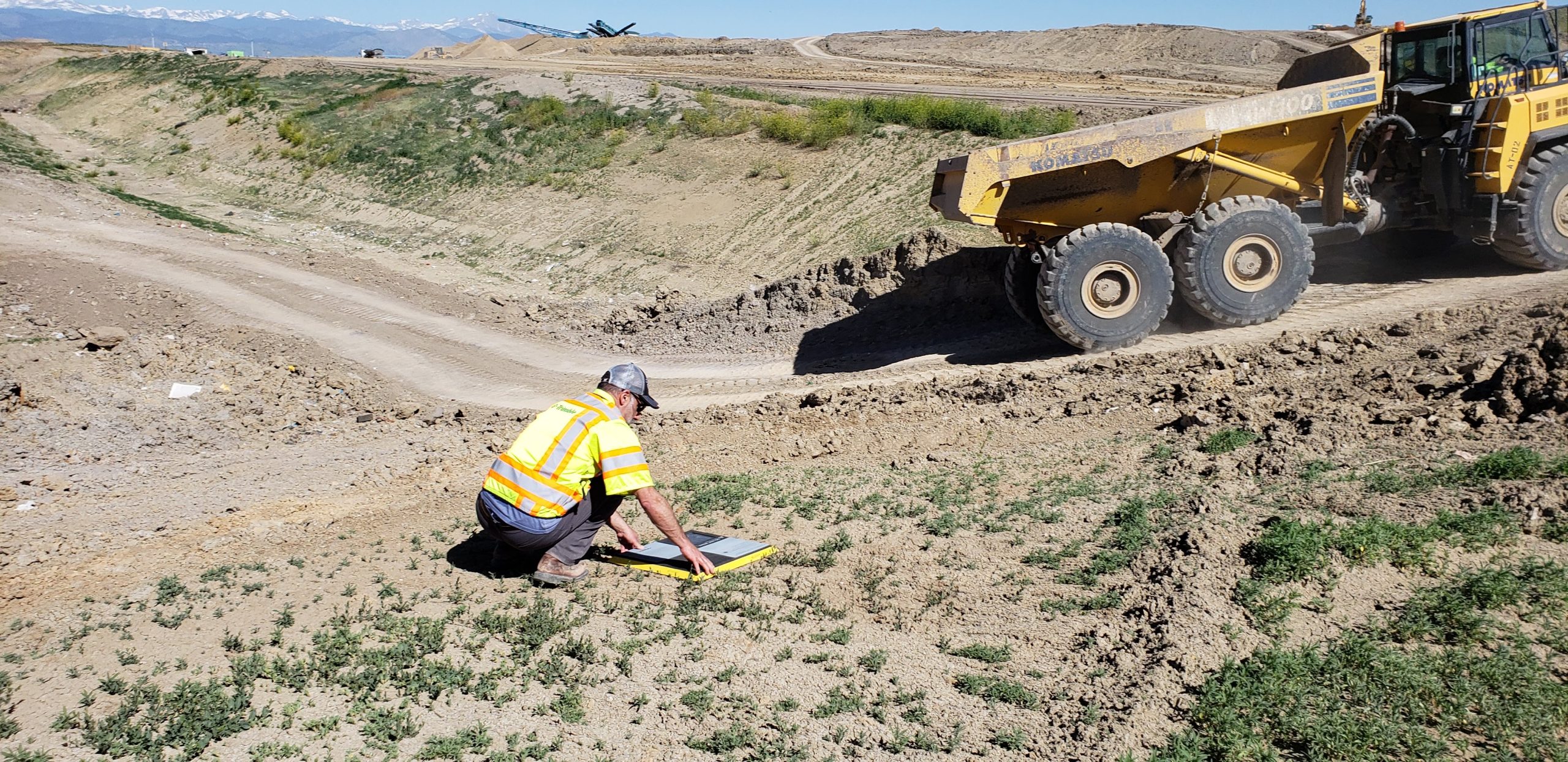 surveyor placing an AeroPoint