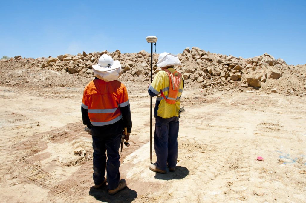 surveyors capturing survey points on a worksite