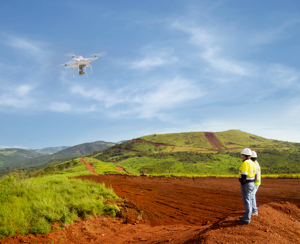 surveyors flying a drone