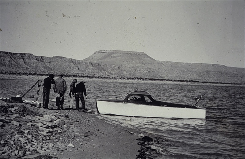 old surveyors using a tidal gauge