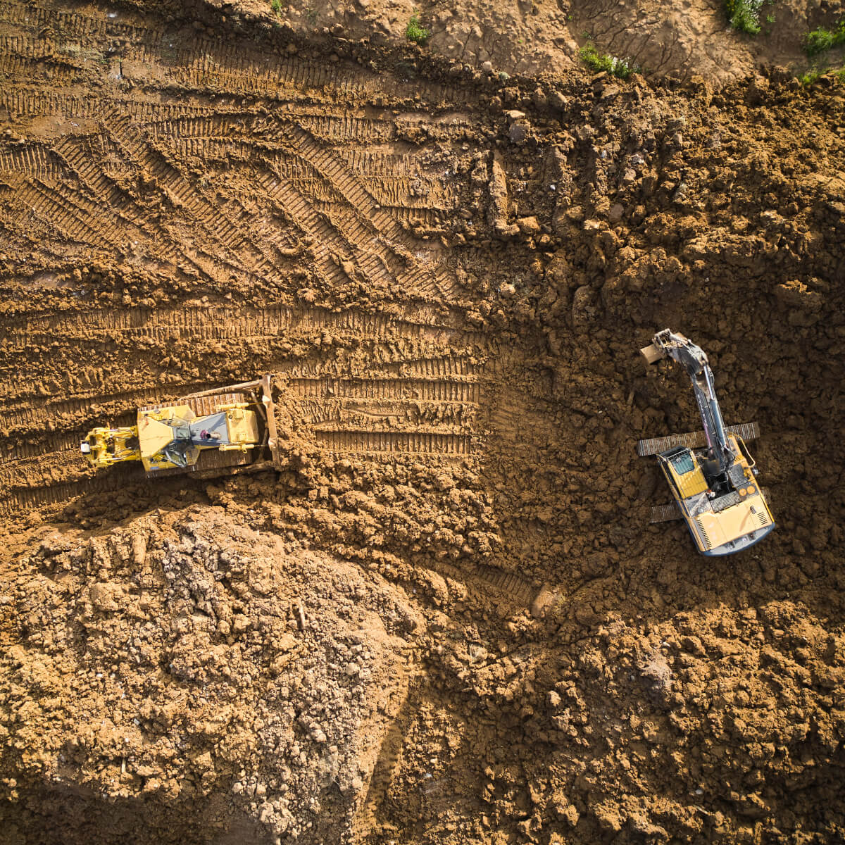 Construction-two-machines-on-dirt-project