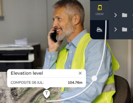 person working at the desk looking at elevation levels