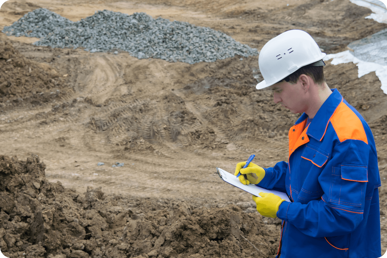 estimator on a construction site estimating a job